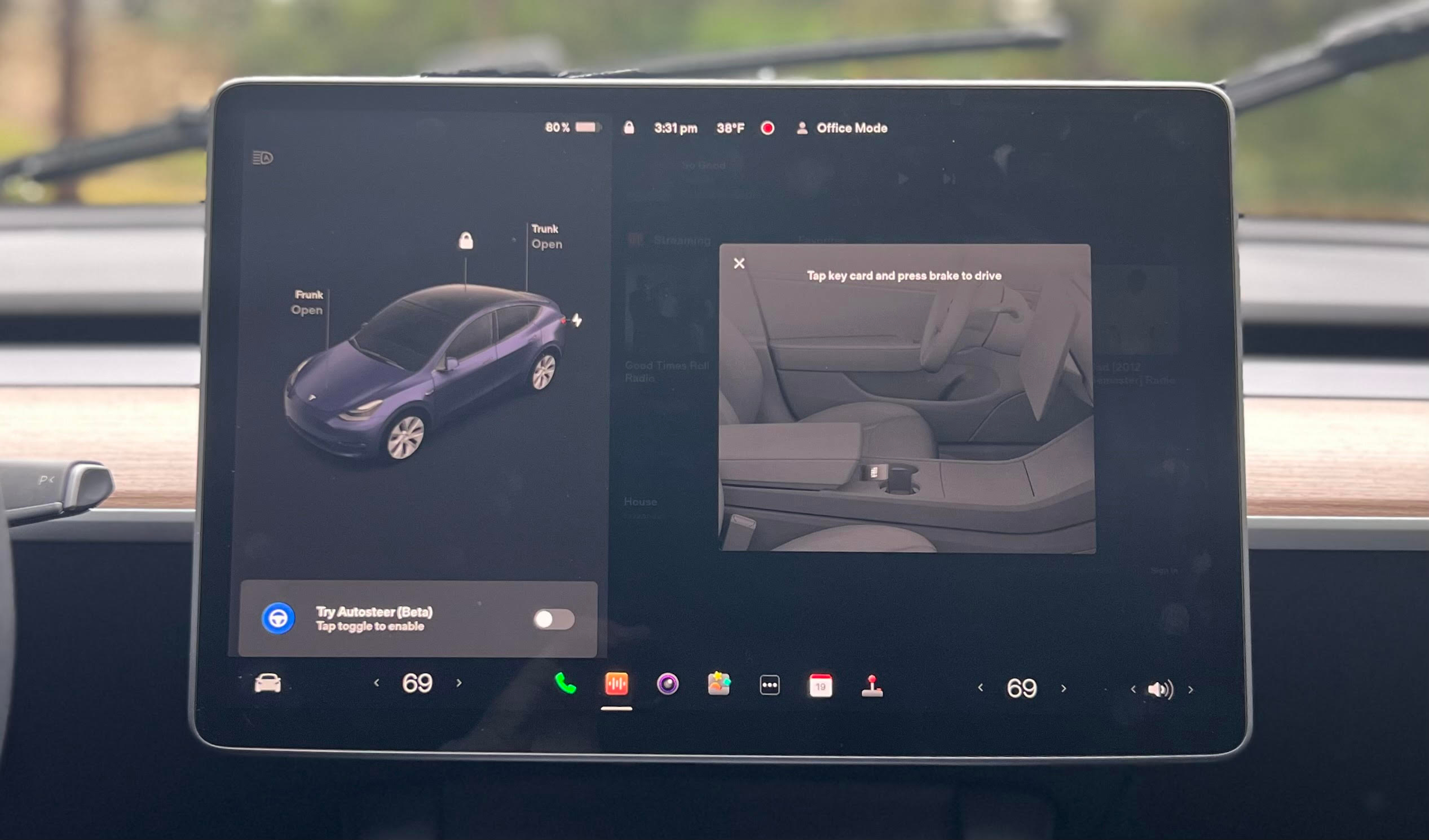 Tesla message “Tap key card and press brake to drive” credit the author