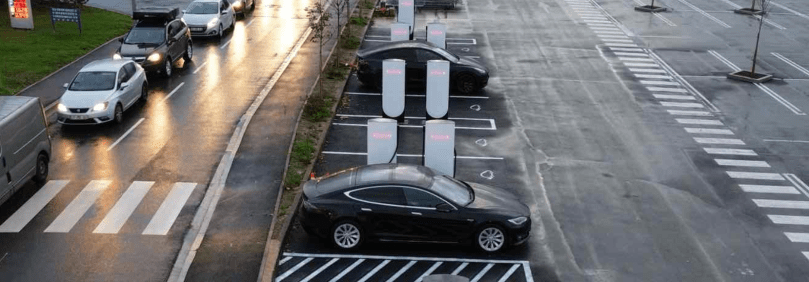 Vehicles charging at a Tesla Supercharger in Bergerac, France. Image Courtesy Tesla, Inc.