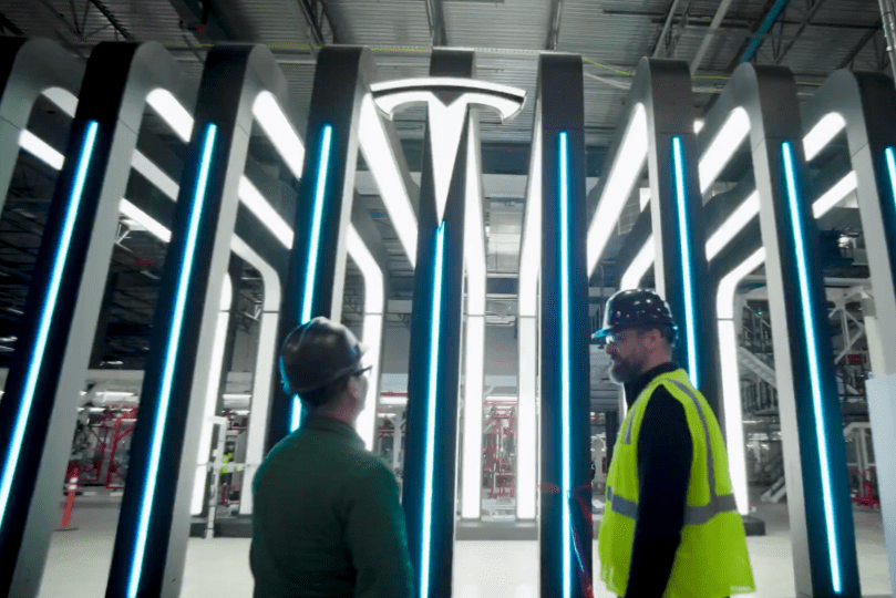 The striking “light tunnel” final inspection station glows inside Tesla’s new dedicated Semi factory in Sparks, Nevada — where every completed truck will undergo meticulous surface and finish checks under intense, shadow-free lighting. Captured from Ashlee Vance’s Core Memory factory tour video, this dramatic end-of-line station highlights the high-quality standards built into Tesla’s all-electric Class 8 Semi production.