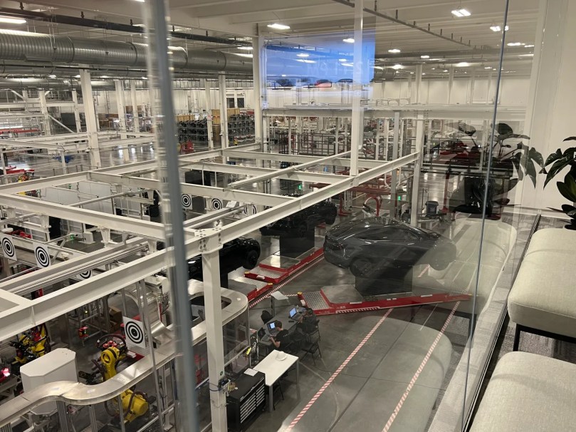 View of Giga Texas factory floor from the conference room where the Getting Stoned podcast interview with Elon Musk took place, July 2022 [Photo by Gail Alfar]