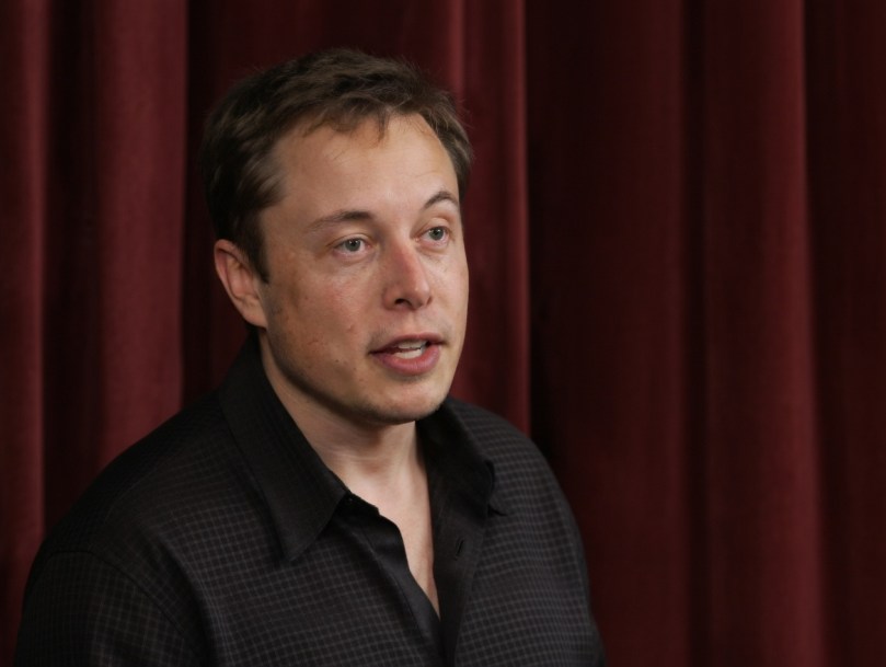 Elon Musk 2003 Stanford Talk – Passionate moment from his first public speaking appearance- Close-up of 32-year-old Elon Musk as he shares his vision during the 2003 Stanford Entrepreneurial Thought Leaders event. A raw, unpolished look at the future founder of SpaceX and Tesla. Enhanced with Grok Imagine for better clarity.