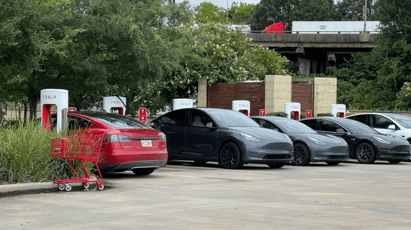Tesla Model Y and Model 3 charging at Superchargers in Baton Rouge, Louisiana. Everyday scenes like this prove that owning or leasing a Tesla is more accessible than it feels — even if you rent and don’t have a home charger. Simple, convenient charging while running errands is real life for many Louisiana Tesla owners. Photo credit: Bearded Tesla (@BeardedTesla on X)