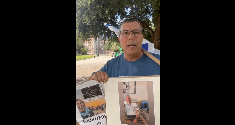 An Israeli mourns the loss of his family on Oct 8, 2022, as he talks to Gail Alfar