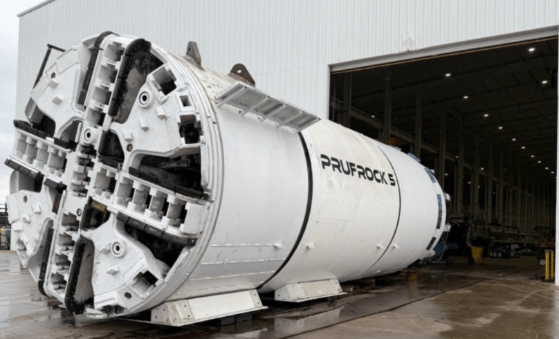 On November 24, 2025, on a rainy day in Bastrop, Texas, Prufrock-5 left the Boring Company factory.